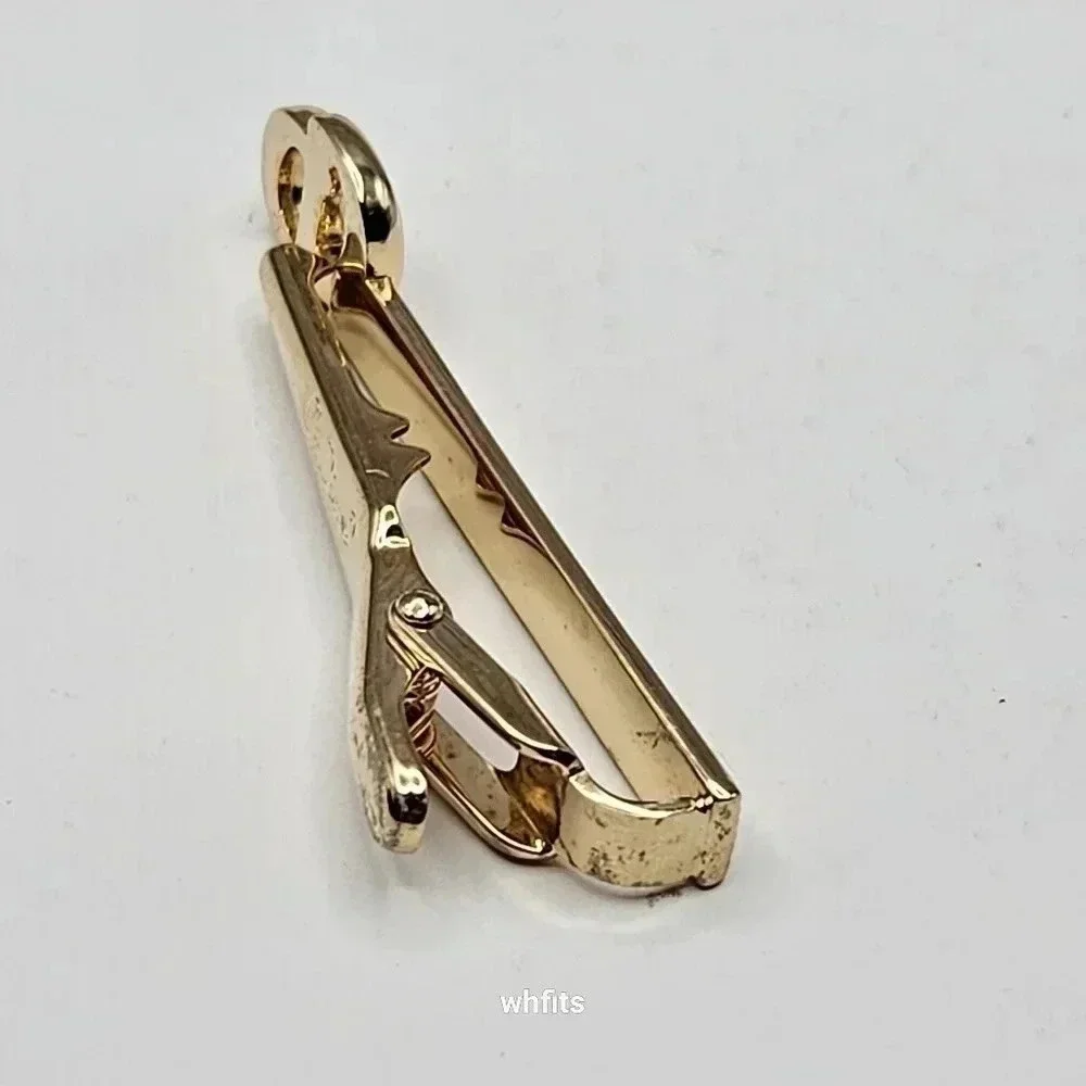 Christian Dior Gold Tone Cufflinks and Tie Bar Set